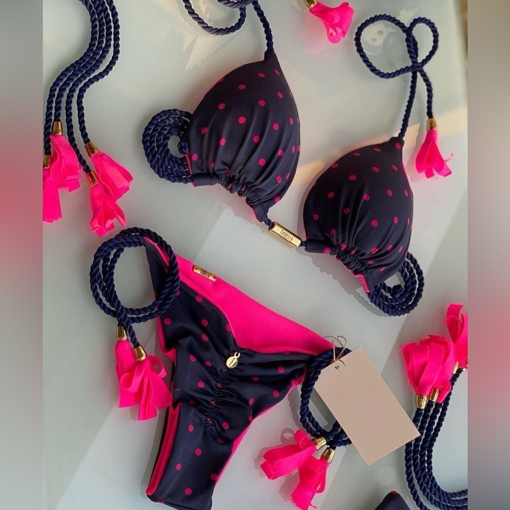 Navy blue and fuchsia swimsuit by Fiorella Swimwear available in sizes S, M, L